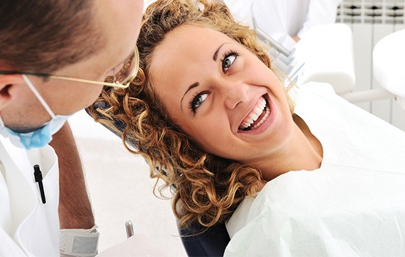 Smiling woman in dental chair