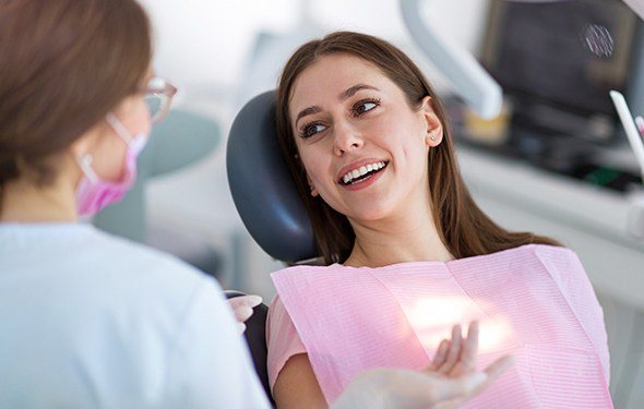 Smiling woman in dental chair