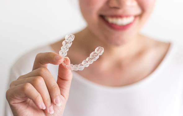 Holding Invisalign