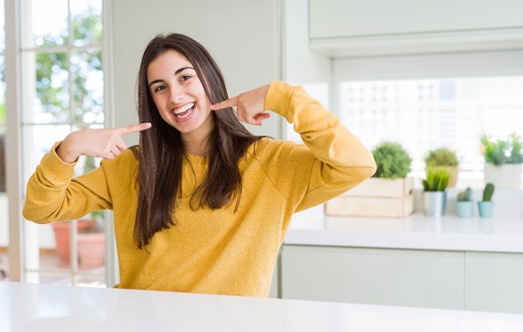 showing off white teeth at home